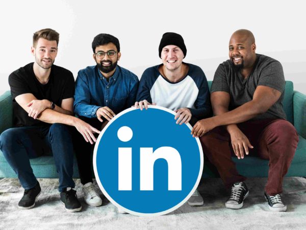 people-holding-linkedin-logo_11zon